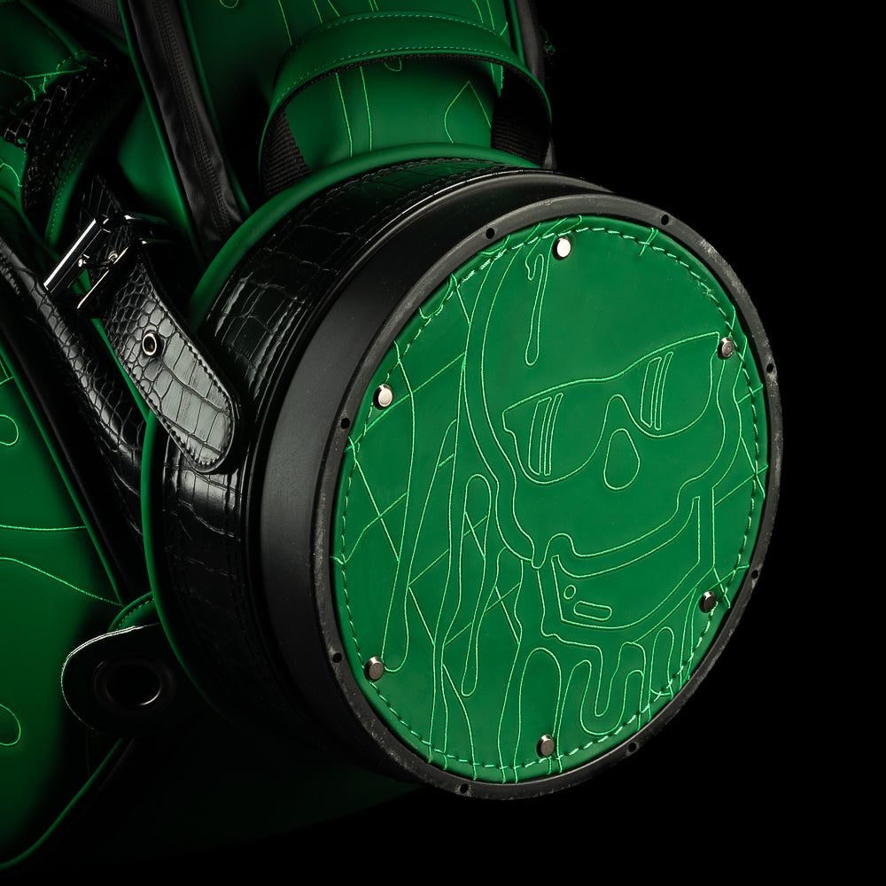 SWAG Golf green quilted melt skull tour staff golf bag with faux croc details.