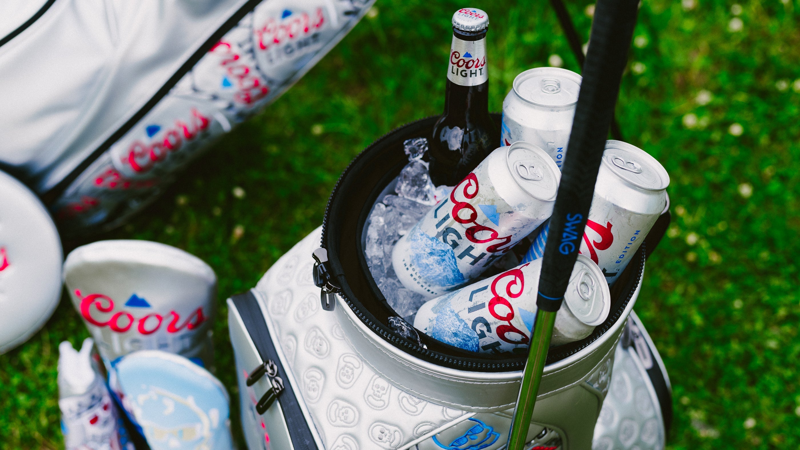 Coors Light x SWAG Golf officially licensed collection featuring limited edition headcovers, bags, and a putter.