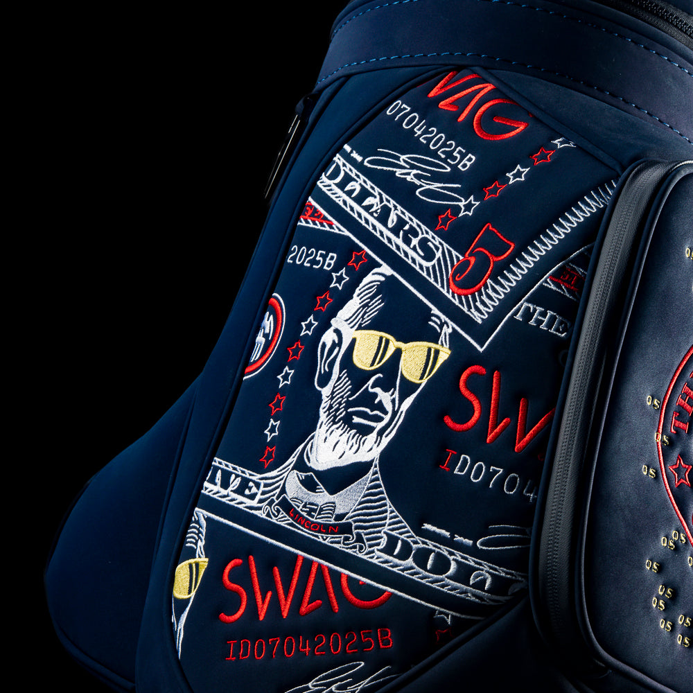 RWB Lincoln Den Caddy insulated cooler blue bag featuring embroidered $5 bill graphics and United States of SWAG emblem.