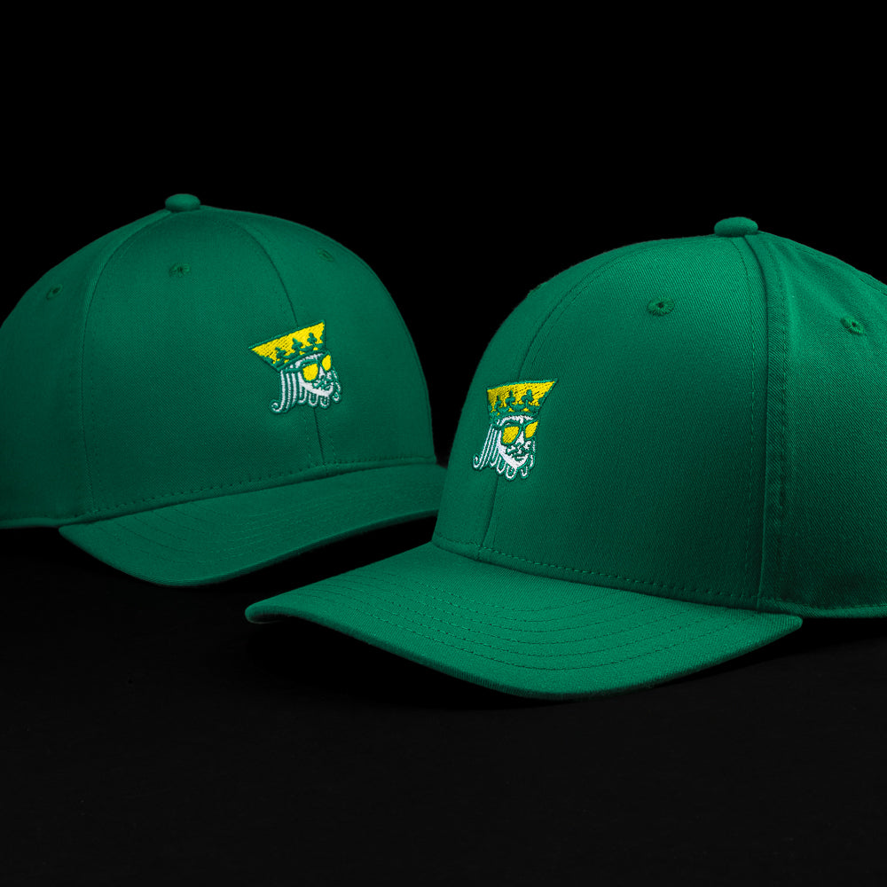 SWAG Golf green golf hat with embroidered King detail on the front and snapback closure.