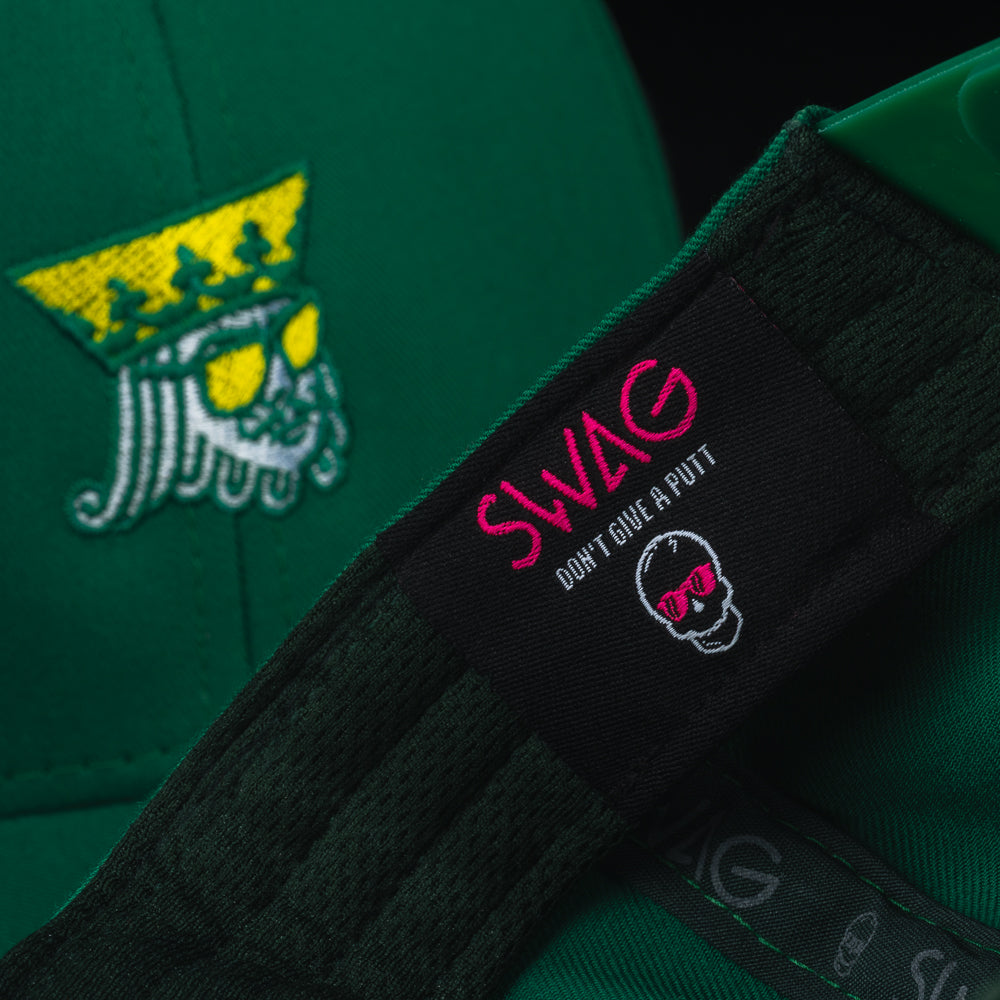 SWAG Golf green golf hat with embroidered King detail on the front and snapback closure.