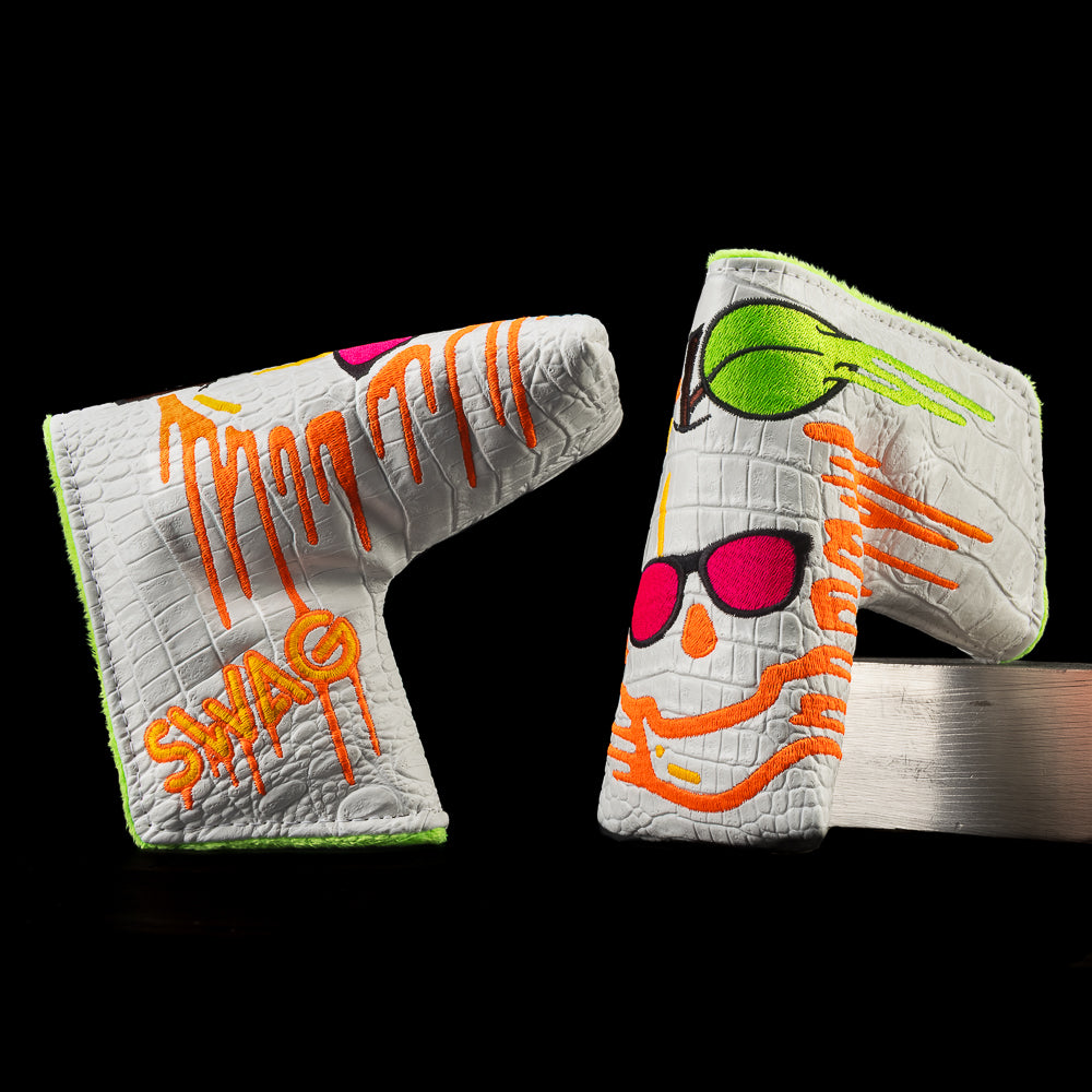 SWAG Golf melting peach skull white faux croc material with neon orange and green melts. Blade golf headcover.
