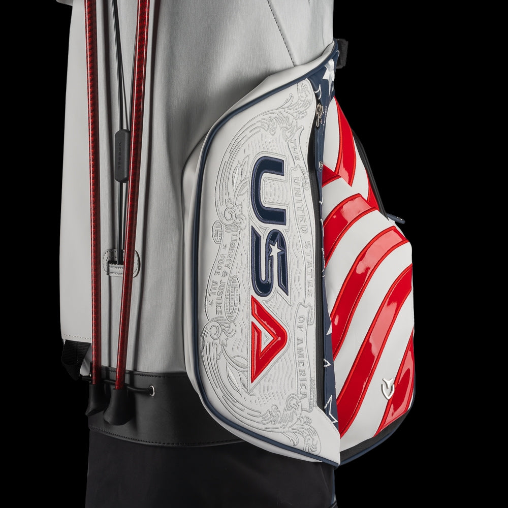 SWAG Golf x Official Ryder Cup 2024 Team Vessel VLS Lux golf stand bag. Featuring a red, white, and blue USA design.