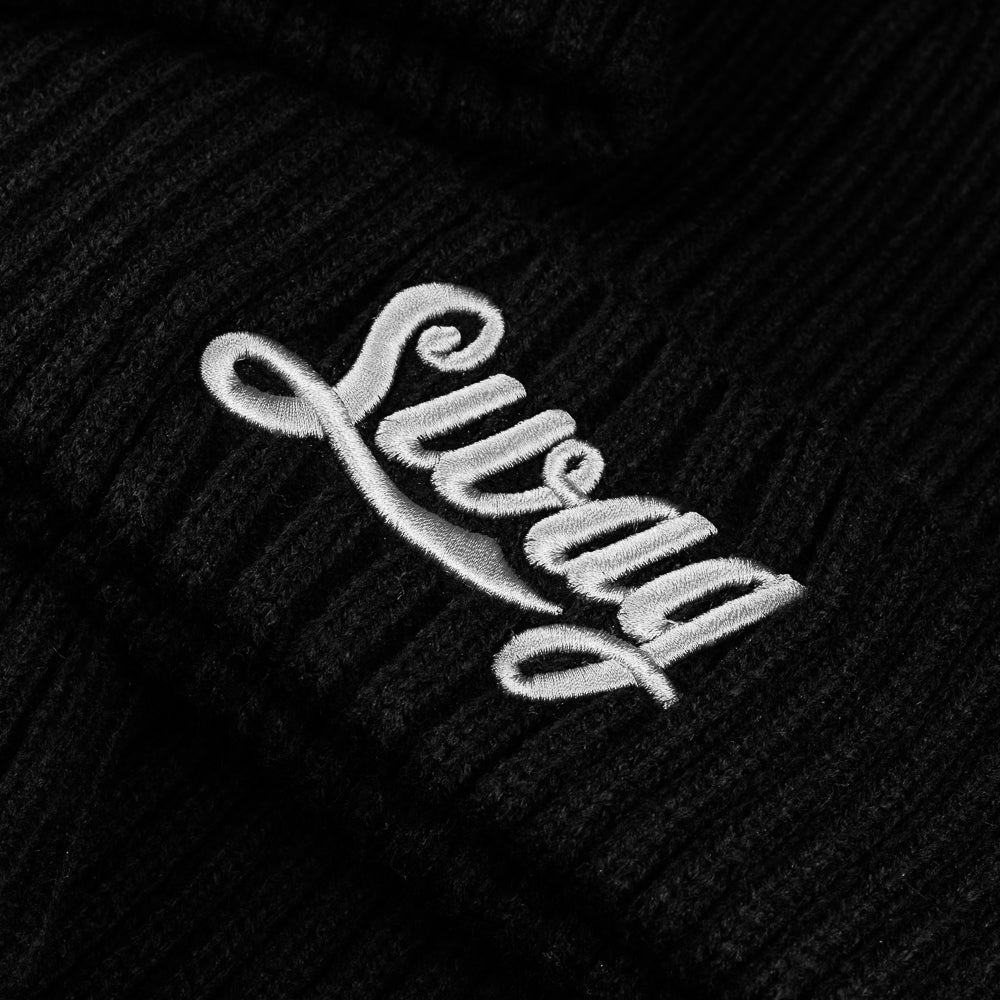 SWAG Golf cola script white and black ribbed knit beanie.