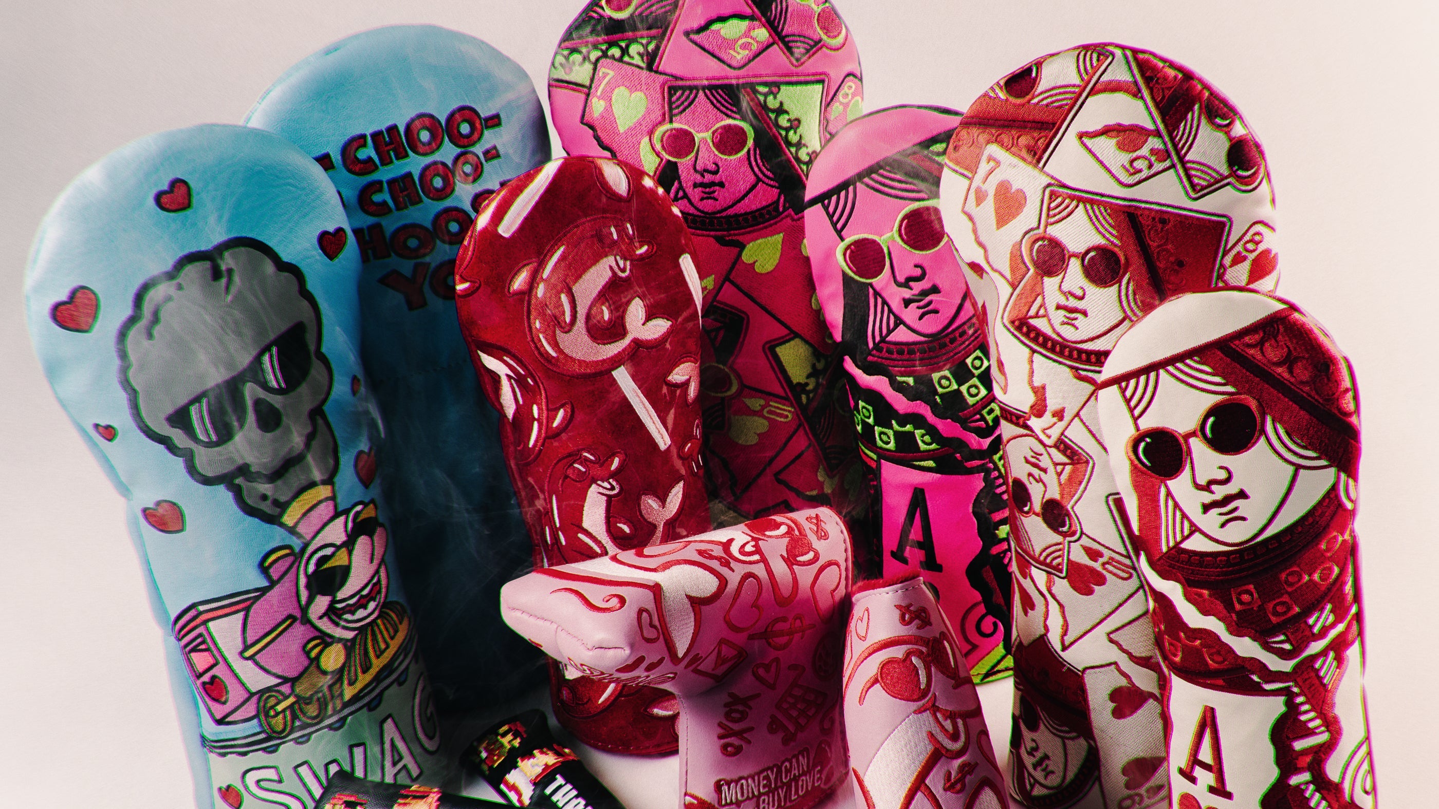 SWAG Golf 2025 Valentine's Day Collection featuring golf headcovers and ball markers.
